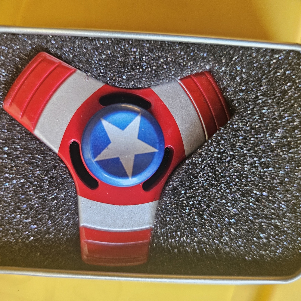 Red and Silver Fidget Spinner with Blue Star